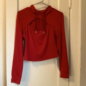 Great top with detail of cut out in front. It’s an active wear or leisure.